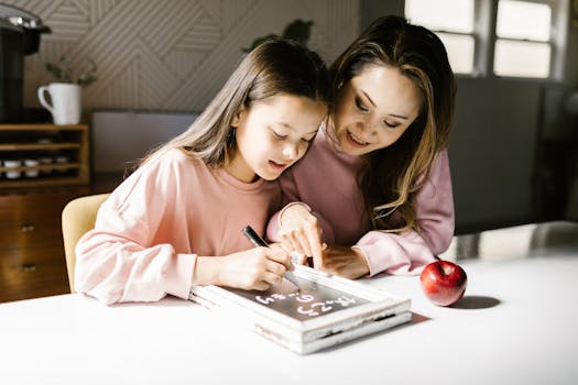 Professional home tutor guiding a child through homework
